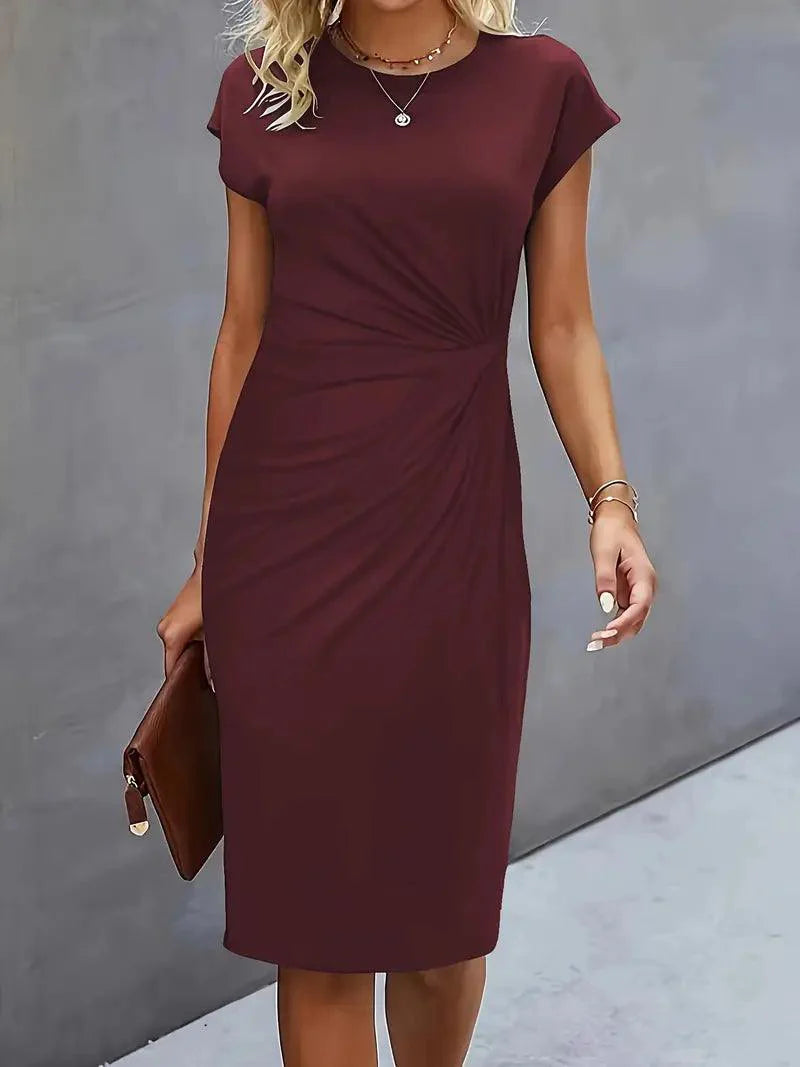 Sofia - Stilfuld slank kjole med rund hals for elegant look