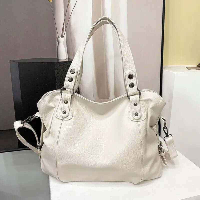 Althea - Stilfuld taske med rummeligt indre flere lommer og behagelige stropper-Handbags-Lundbutik-Hvid-Standard-Lund Butik