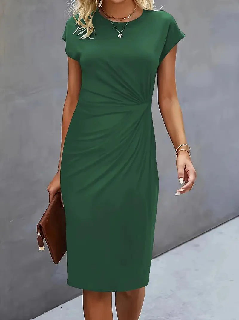Sofia - Stilfuld slank kjole med rund hals for elegant look