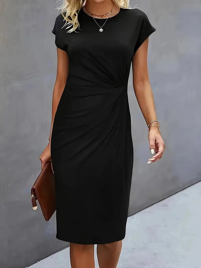 Sofia - Stilfuld slank kjole med rund hals for elegant look