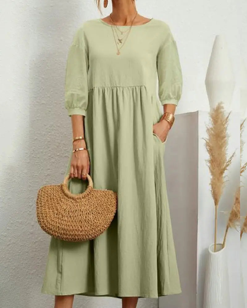 Doris - Løs midikjole med rund hals og halve ærmer-Dresses-Lundbutik-Lysegrøn-S-Lund Butik