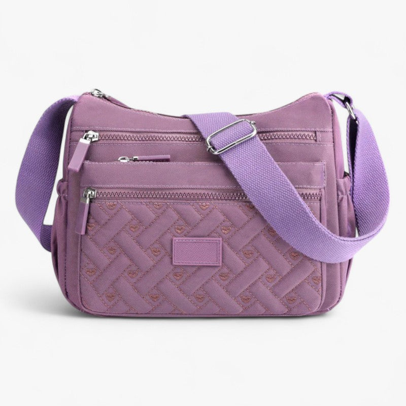 Niomi - Klassisk skuldertaske med justerbar rem og lynlåslommer Lundbutik