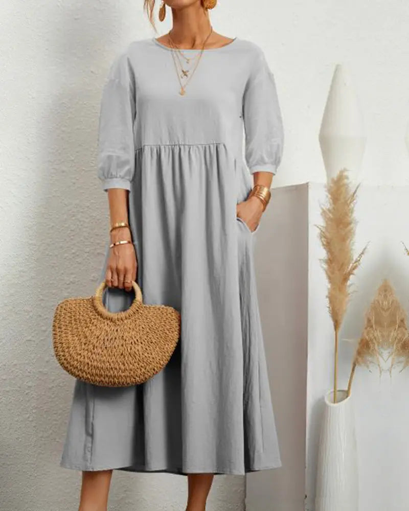 Doris - Løs midikjole med rund hals og halve ærmer-Dresses-Lundbutik-Grå-S-Lund Butik