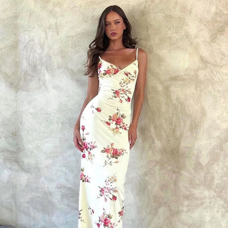 Sophia - Lang kjole uden ærmer med blomsterprint og spaghettistropper Lundbutik